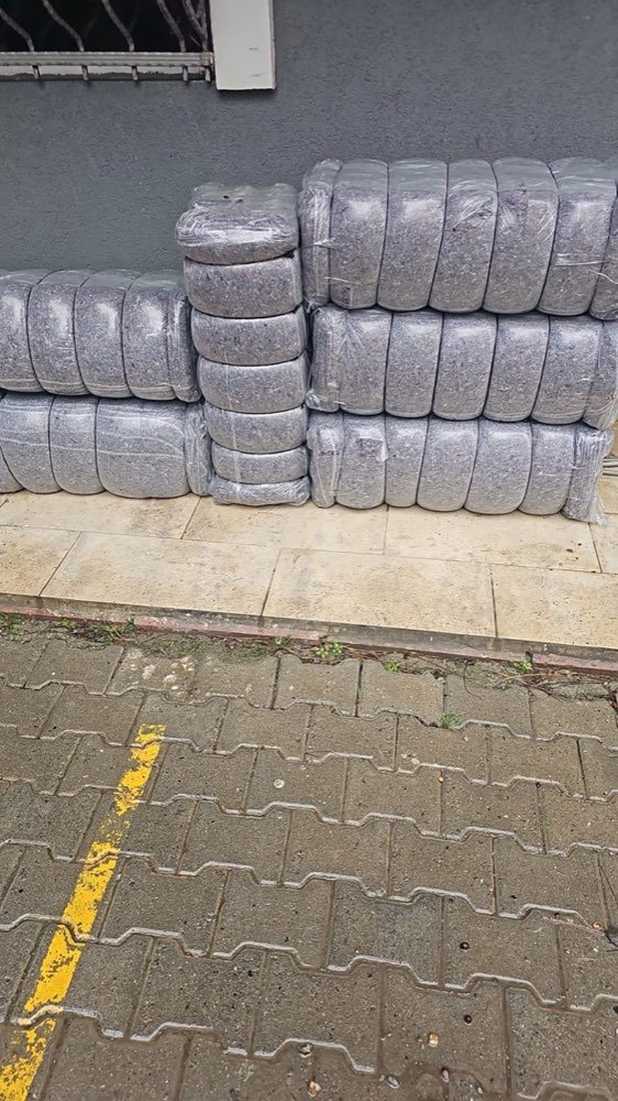 Sacks of feed brought out to the street